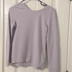 Girls purple athletic sweatshirt with cris cross back